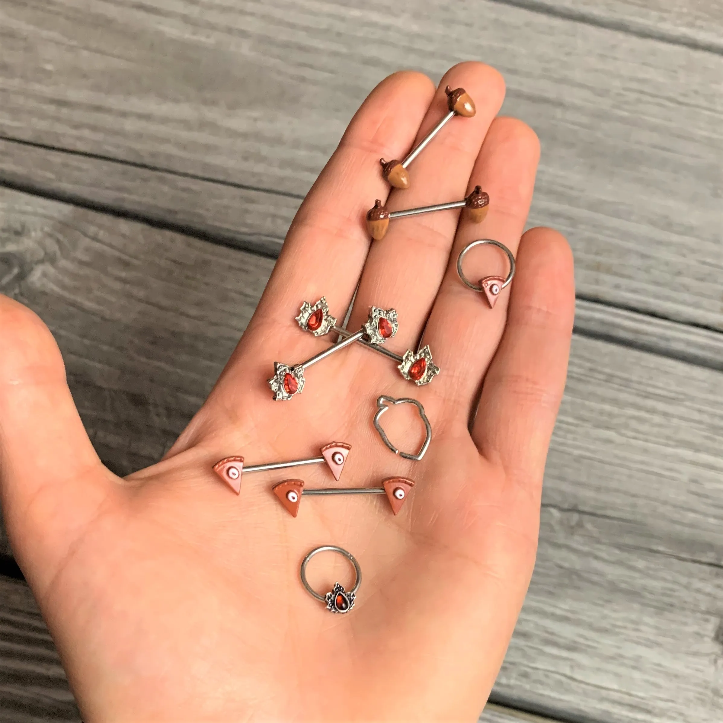 14 Gauge 5/8 Red Gem Holly Leaf Holiday Barbell Nipple Ring Set