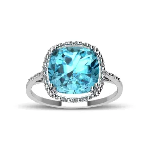 Blue Topaz and Diamond Accent Ring in Sterling Silver
